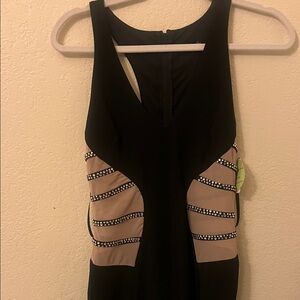 Elegant Black and Tan Sleeveless Dress